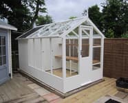 Greenhouses with sheds
