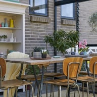 Inside a Janssens Arcadia lean-to greenhouse