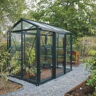 Janssens Helios Urban black greenhouse with plants