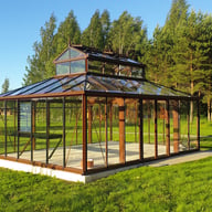 Janssens Kathedral orangery greenhouse in a custom RAL brown finish