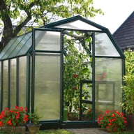 Palram Canopia Eco Grow 6x8 Green greenhouse front lifestyle photograph