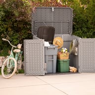 Lifetime Horizontal Plastic Outdoor Storage Unit Driveway Setting