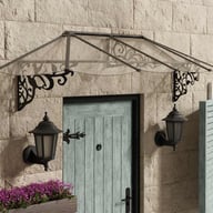 Lily 2600 Black Clear Door Canopy in a garden setting
