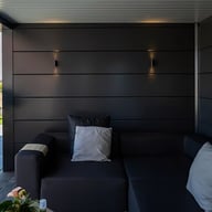 Inside a Telluria metal garden lounge