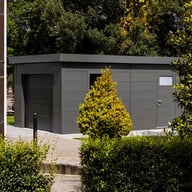 Telluria steel garage installed on a driveway