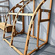 Norhage lean-to Swedish pine frame and solid plywood arch construction