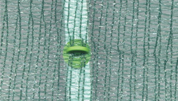 Elite shade netting mesh with the green lining hook clip that fixes it to the glazing bars