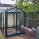 Janssens Helios Urban green greenhouse in a garden
