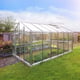 Janssens Senior silver greenhouse in a garden