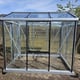Front view of a Janssens Urban Hobby silver greenhouse