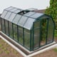 Palram Canopia Eco Grow 6x12 Green greenhouse elevated lifestyle photograph