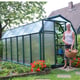 Palram Canopia Eco Grow 6x12 Green greenhouse side lifestyle photograph