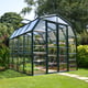 Palram Canopia Grand Gardener 8x8 Green greenhouse front lifestyle photograph