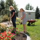 Lifetime 7x9.5 Plastic Shed Garden Lifestyle People