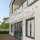 Bordeaux 8920 White Mist Door Canopy in a garden setting