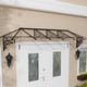 Lily 3600 Black Clear Door Canopy in a garden setting