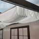 Stockholm 3.4m x 9.5m Patio Cover in Grey in a garden setting
