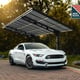 Sydney Wave Carport Black in a garden setting