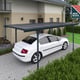 Verona 5000 Carport Grey in a garden setting