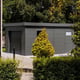 Telluria steel garage installed on a driveway