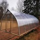 Norhage Tre 300 greenhouse on decking, front view