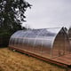 Norhage Tre 300 greenhouse on decking, side view