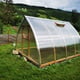 Norhage Tre 300 greenhouse on a hillside plot