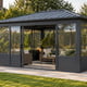 Sojag Charleston Solarium 3.7m x 4.6m in a British garden