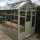 Swallow Robin 5x8 Wooden Greenhouse in Summer Green With Extra Shelving