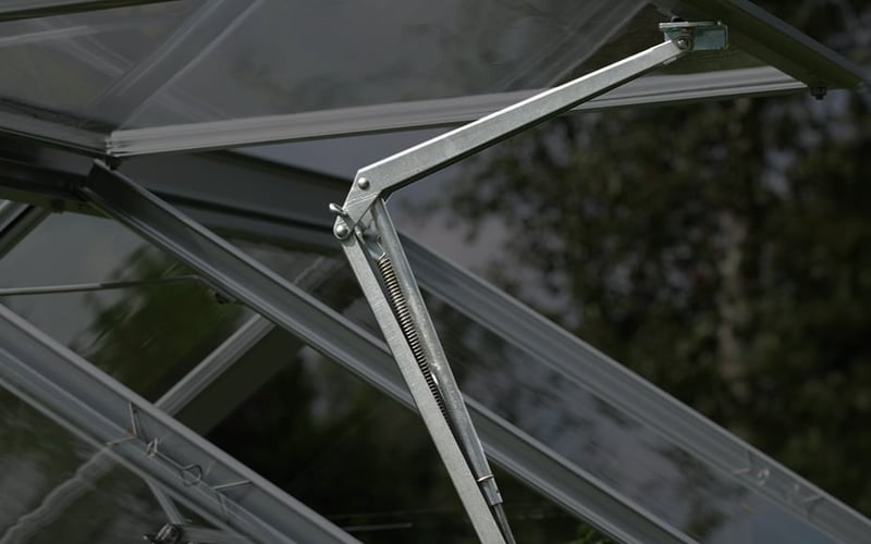 Automatic vent opener for greenhouse courgette ventilation - prevents overheating and mildew