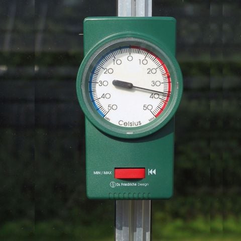 Vitavia max min dial thermometer mounted on a greenhouse glazing bar showing the temperature in Celsius